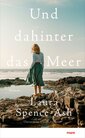 Das Cover zeigt eine Frau auf Felsen am Meer.