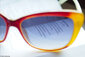 Bunte Sonnenbrille liegt auf einem Gedicht von Heinrich Heine